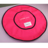 1. `Close-up demonstration of magnetic attraction closure on custom circular fire resistant fabric cover` 2.